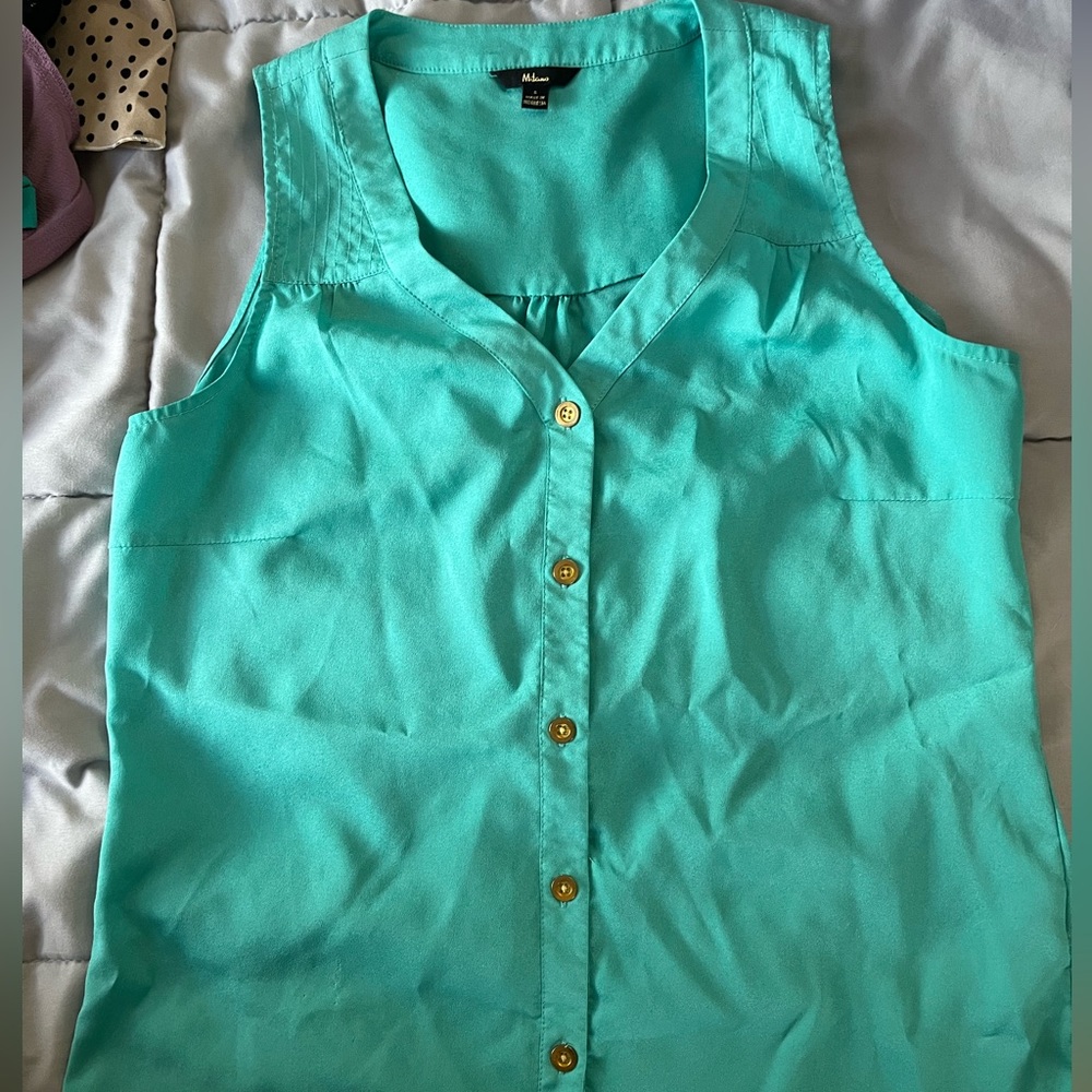 Milano size small turquoise spring top.